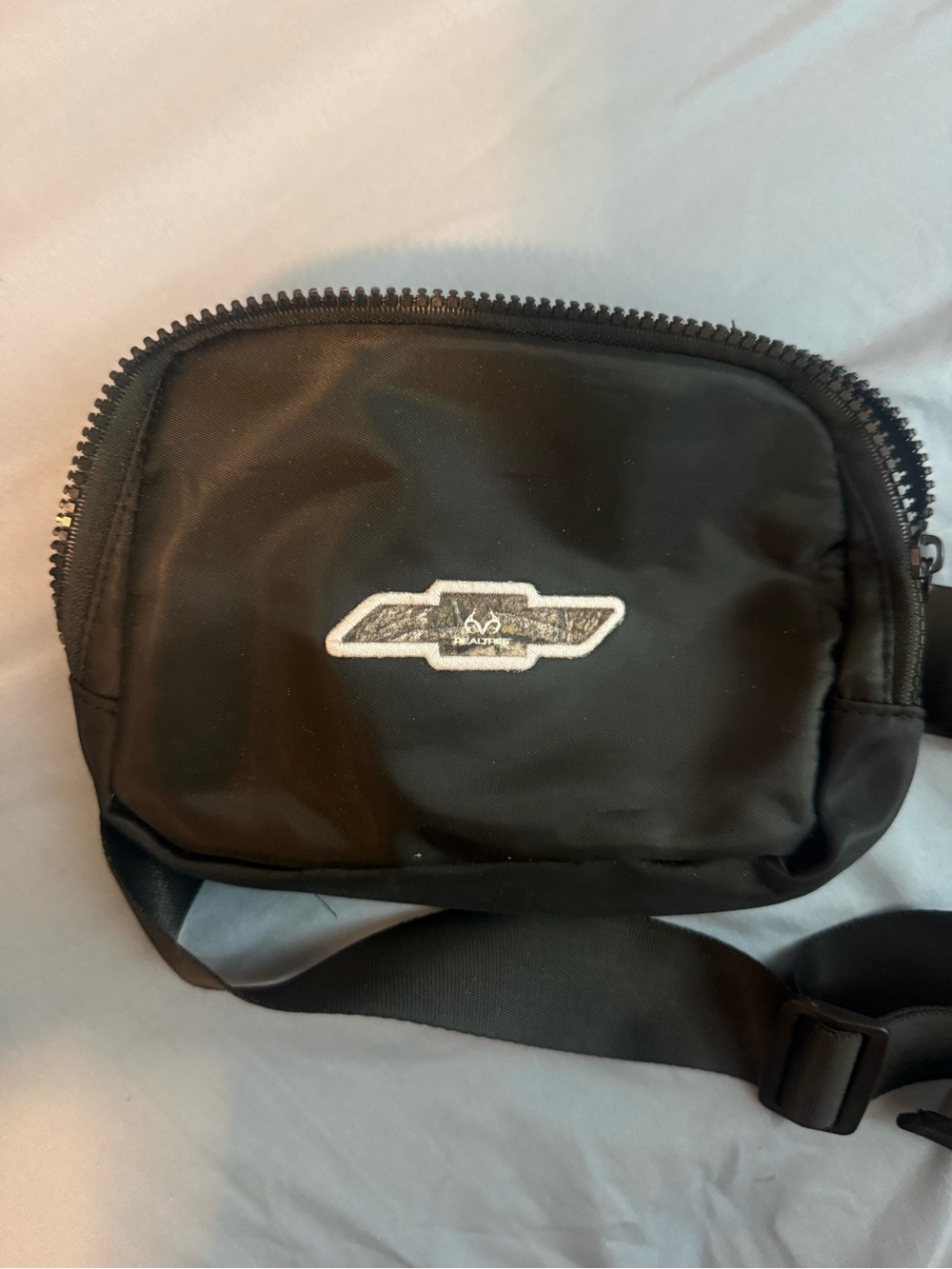 Black Crossbody Sling Bag with Chevy X Reatree Logo